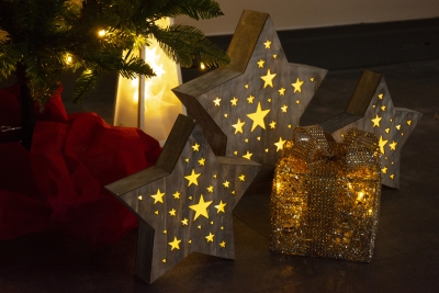 Trendem letošních Vánoc jsou přírodní materiály a dostatek světla